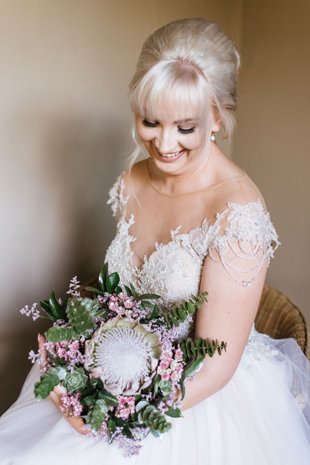 wedding bride with floral bouquet of flowers